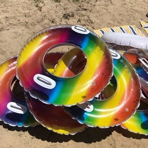 Brand new in sealed package rainbow innertube raft pool float adult or kid